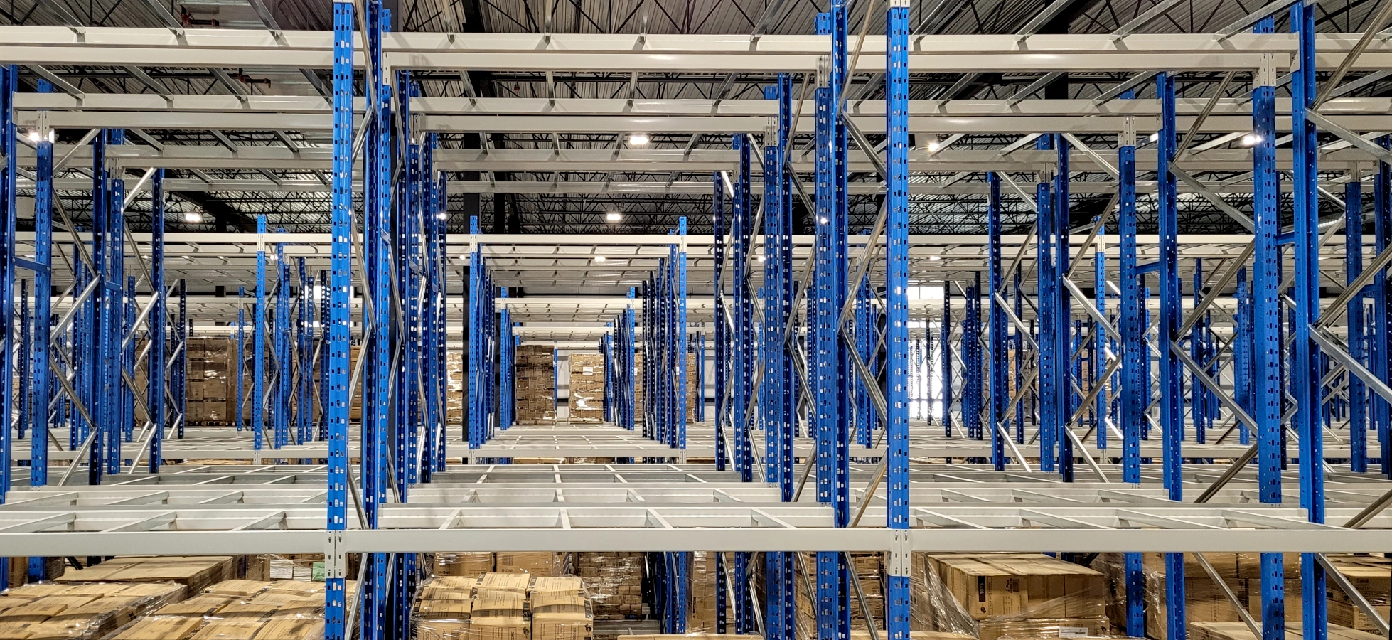 Pedlex augmente l'espace d'entreposage pour le Groupe Ricochet palettiers double profondeur racking témoignage client étude de cas